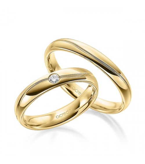 Anillos de boda en oro amarillo con una lénea redondeada y un diamante - Wedding bands - 




