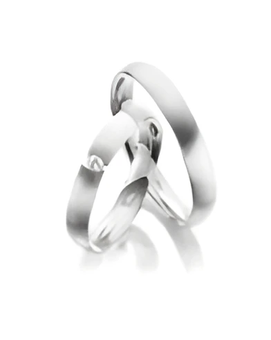 Alianzas de matrimonio mate en Platino con un diamante al aire - Alianzas de boda - 

