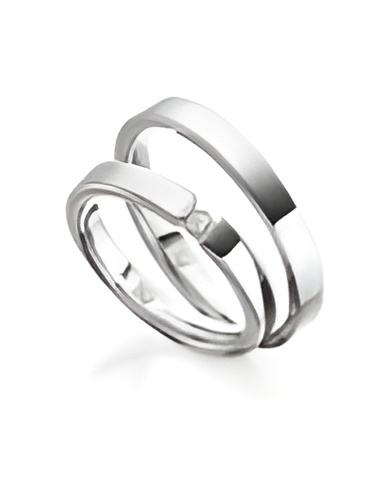 Finos anillos de matrimonio en oro blanco con un diamante al aire - Alianzas de boda - 

