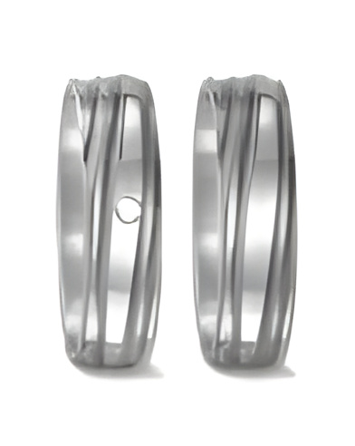 Nuevos anillos de titanio con acabado especial y un diamante - Alianzas de boda - 

