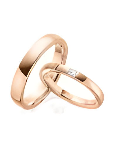 Alianzas de boda de oro con dos diamantes talla princesa