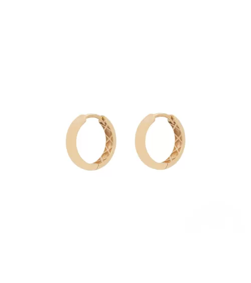 Aros ovalados de oro de 18 quilates con un diamante | Staring
