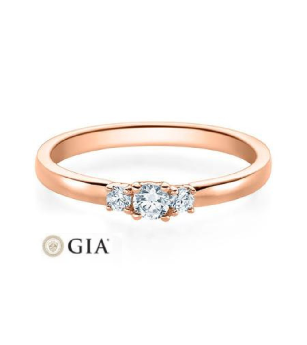 Anillo de compromiso con 3 diamantes trilogy en oro rosa| Staring