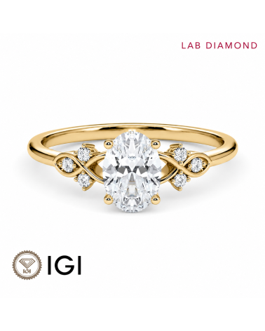 Anillo de compromiso con diamante oval de laboratorio certificado IGI en oro amarillo de 18K, disponible en Madrid y Barcelona