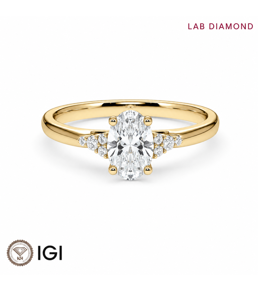Anell de compromís amb diamant oval de laboratori en or groc de 18 quirats | Staring