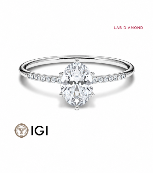 Anell de compromís amb pavé i diamant talla oval a Tarragona  | Staring