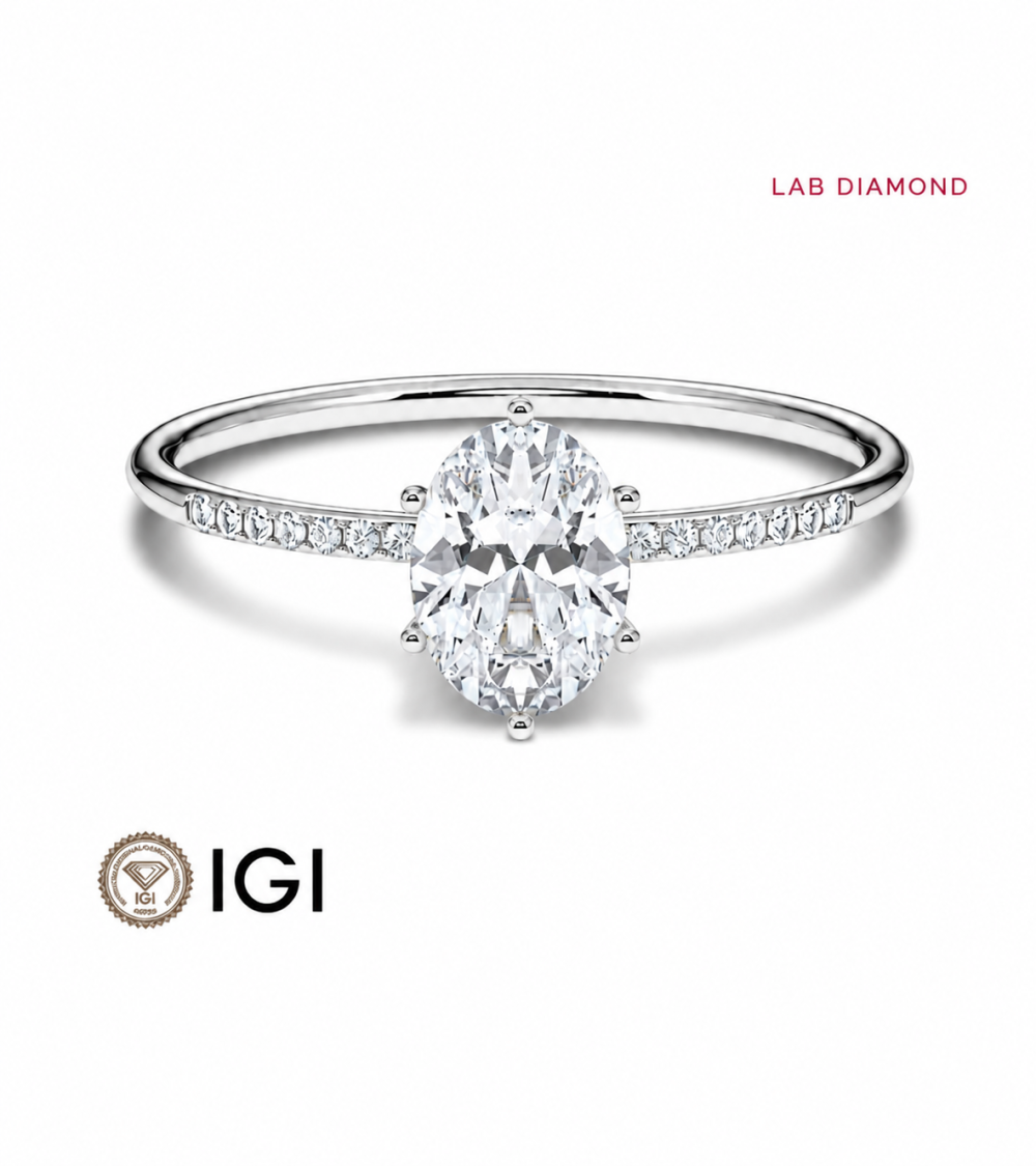 Anell de compromís amb pavé i diamant talla oval a Tarragona  | Staring