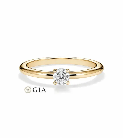 Anillo de compromiso en oro amarillo con diamante redondo |Staring