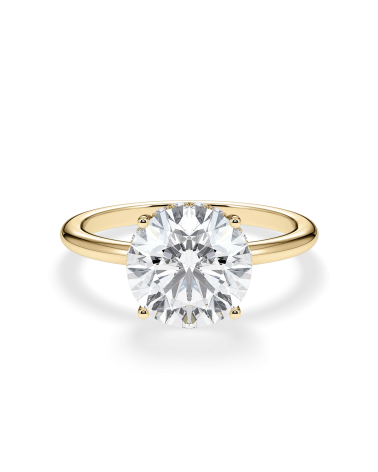 Anillo de compromiso en oro amarillo con diamante redondo |Staring