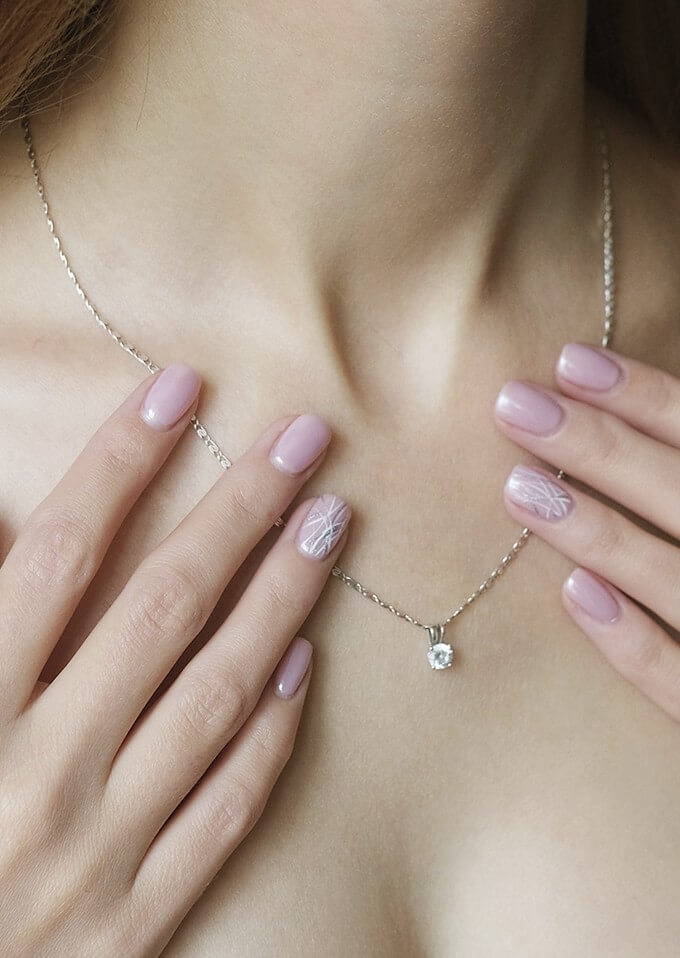 Beautiful earring on a woman's neck